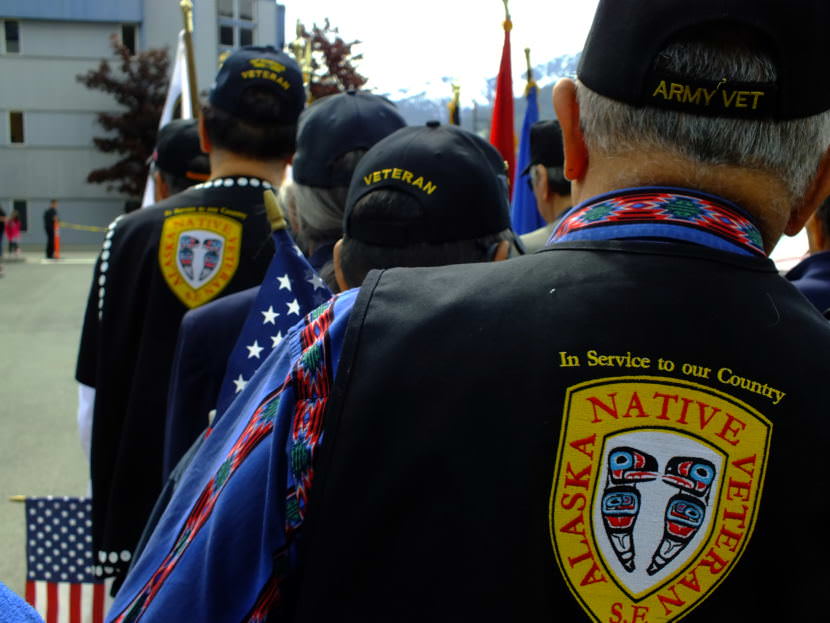 Veteran flag-bearers wait for start of a 2017 Memorial Day observance at Southeast Alaska Native Veterans Memorial Park. (Photo by Matt Miller/KTOO)