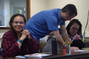 Learning Connection teacher Jeff Smith helps a student during a math class on Tuesday, May 2, 2017.