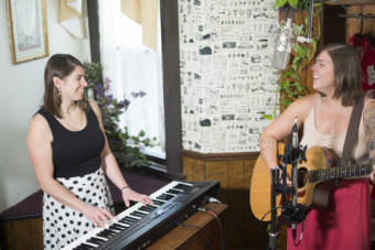Kat Moore and Emma Hill perform a Red Carpet Concert at the Alaskan Hotel during the 2017 Alaska Folk Festival. (Photo by Annie Bartholomew/KTOO)