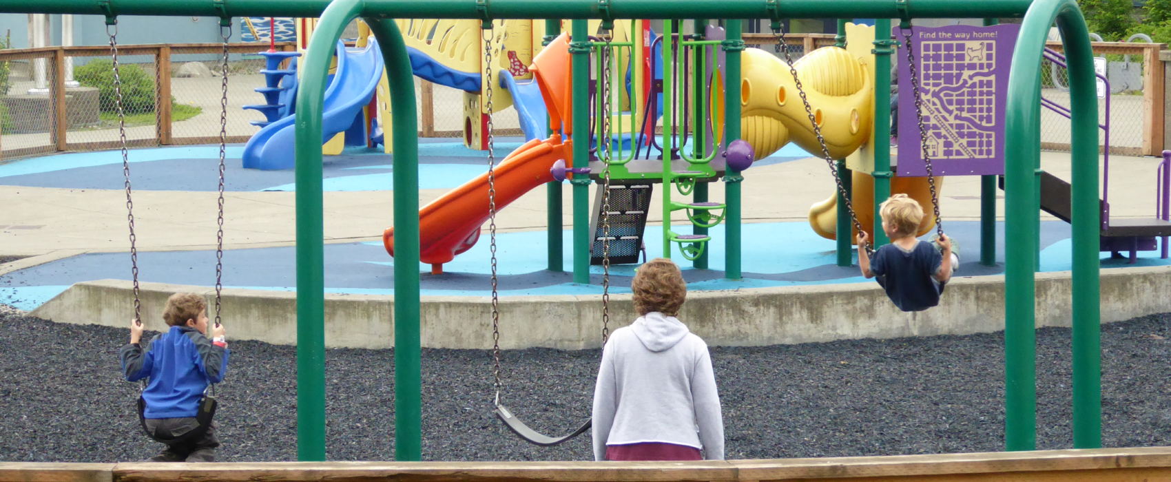 Juneau kids play on the playground in front of Harborview Elementary School on Wednesday.