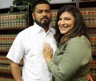 Gerry Realin (left) and his wife Jessica are working to get first responders workers' compensation benefits in Florida. (Photo by Abe Aboraya/WMFE)