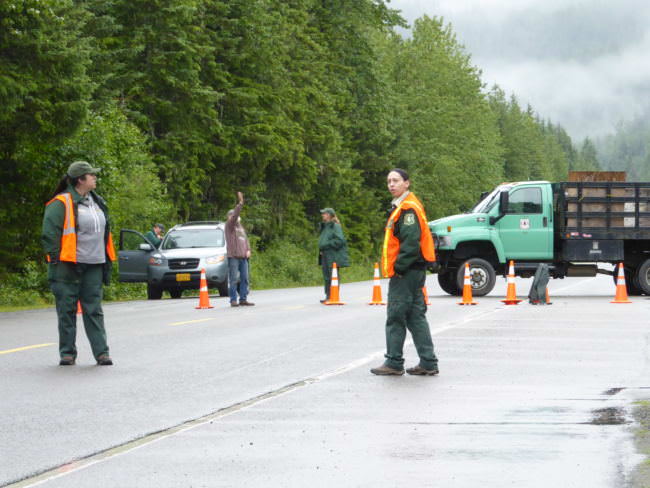 Forest Service employees stand ready to turn visitors away from the Mendenhall Glacier Recreation Center after a burglary July 2, 2017.