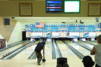 Wayne Fu Smallwood bowls at Taku Lane LLC on Saturday.