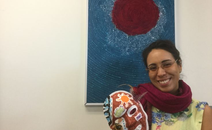 A brain injury survivor shows her mask at Access Alaska. (Photo courtesy Annette Alfonsi/Unmasking Brain Injury)