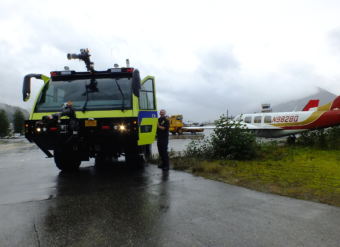 Firefighter Craig Brown with A-1, Capital City Fire/Rescue's newest Airport Rescue Firefighting (ARFF) vehicle, at Juneau International Airport.