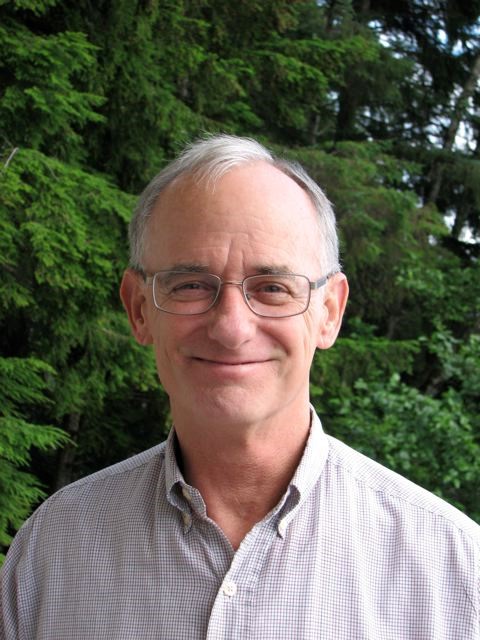 Jeff Short standing in front of trees.