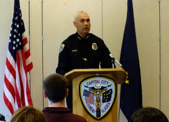 Juneau Police Chief Ed Mercer speaks to family and colleagues during a brief ceremony at the Juneau Police Department on July 31, 2017.