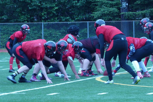 The Juneau-Douglas High School Crimson Bears practice at Adair-Kennedy Memorial Park on Friday, July 28, 2017.
