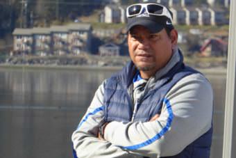 Thunder Mountain High School football coach Randy Quinto oversees his team at the Juneau Maritime Festival on Saturday, May 6, 2017.