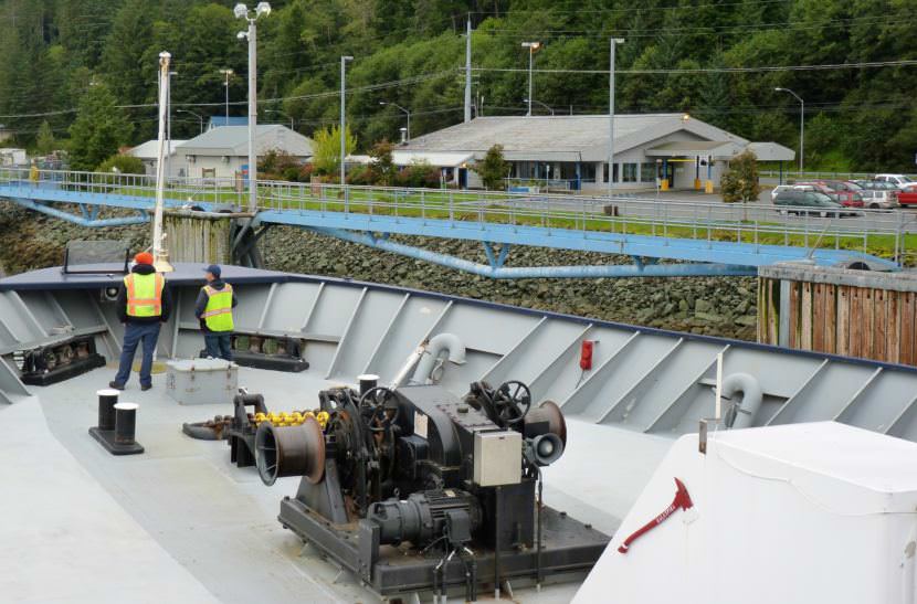 9-18-17 Crew members stand of the front deck of the ferry Malaspina as it pulls away from Juneau's Auke Bay ferry terminal Sept. 18, 2017. Photo by Ed Schoenfeld