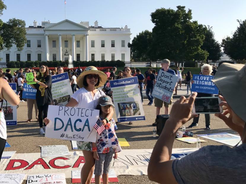 A mother and daughter pose for photo near the White House in Washington, D.C., on Sept. 4, 2017.