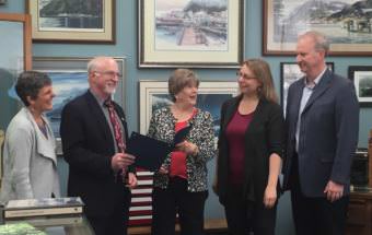 Nancy Lehnhart, Superintendent Mark Miller, Assemblywoman Mary Becker, Sealaska Heritage Institute Art Director Kari Groven and School Board President Brian Holst meet to read a proclamation declaring Sept. 10- 16 National Arts in Education Week. (Photo by Adelyn Baxter/KTOO)