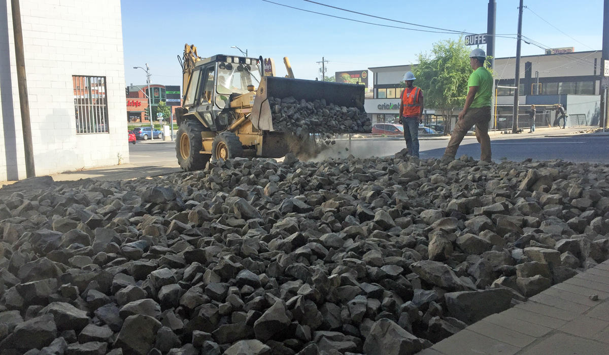 The city of Spokane is spending $150,000 to place boulders under an overpass in hopes of detering the homeless population from camping there. (Photo by Emily Schwing/Northwest News Network)