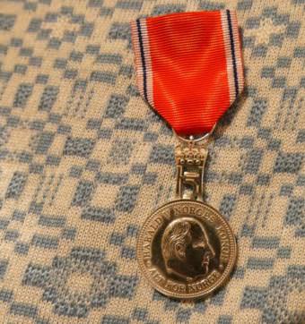 Petersburg resident, Glo Wollen, received this Medal of St. Olav for her work to strengthen the relationship between Norway and the U.S. (Photo by Angela Denning/KFSK)