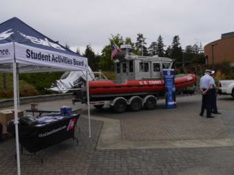 Coast Guard members recruit on the University of Alaska Southeast campus in Juneau on Oct. 2, 2017.
