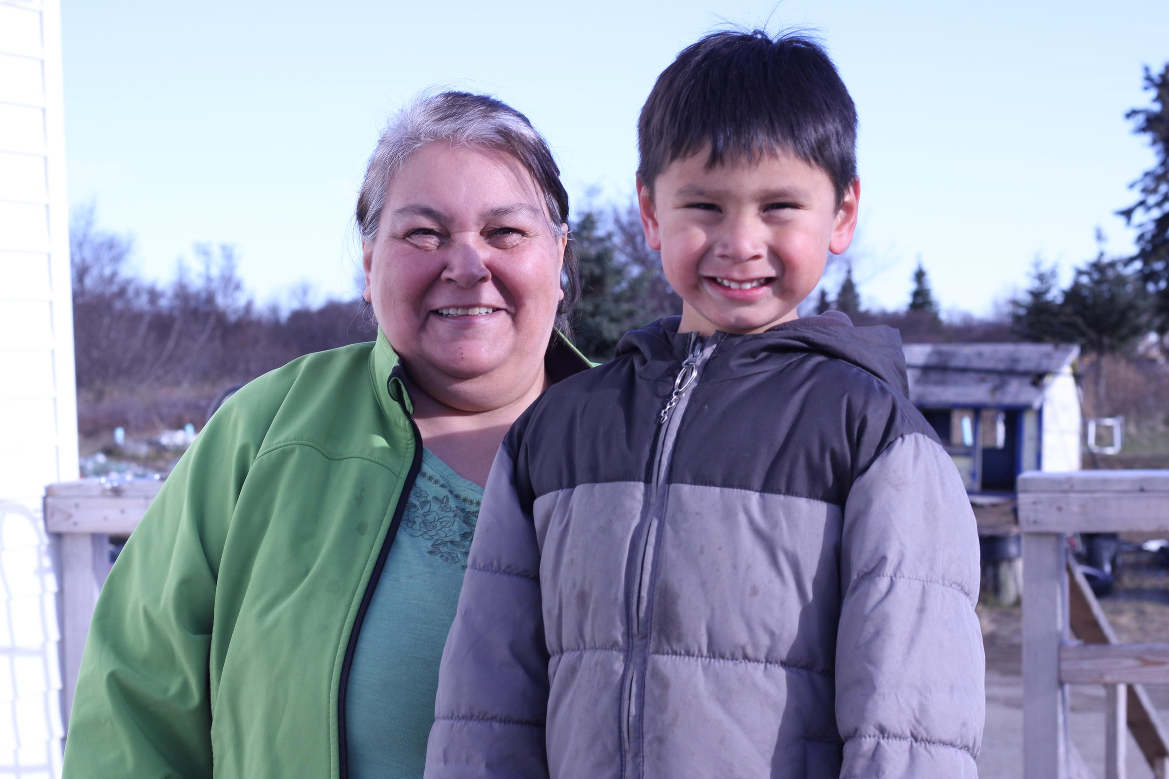 Nola Angasan posed with her adopted grandson, 4-year-old Fischer Angasan. (Photo by Avery Lill/KDLG)
