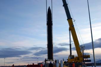 One of 40 ground-base interceptor missiles at Greely’s missile-defense base is lowered into its silo. (Photo courtesy Missile Defense Agency)