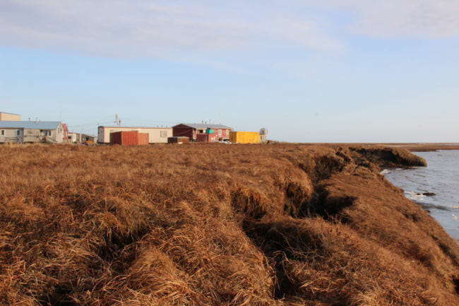 The nearest homes are now just 40 feet from the edge of the Ninglick River. The village could lose that amount of land in just one or two storms. (Photo by Rachel Waldholz/Alaska's Energy Desk)