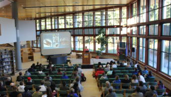 Forest Haven, a Ph.D. candidate in cultural anthropology at U.C. Irvine from Metlakatla, gives a keynote address on the economies of identity for Alaskan Natives at the second annual Power & Privilege Symposium at the University of Alaska Southeast. (Photo by Adelyn Baxter/KTOO)
