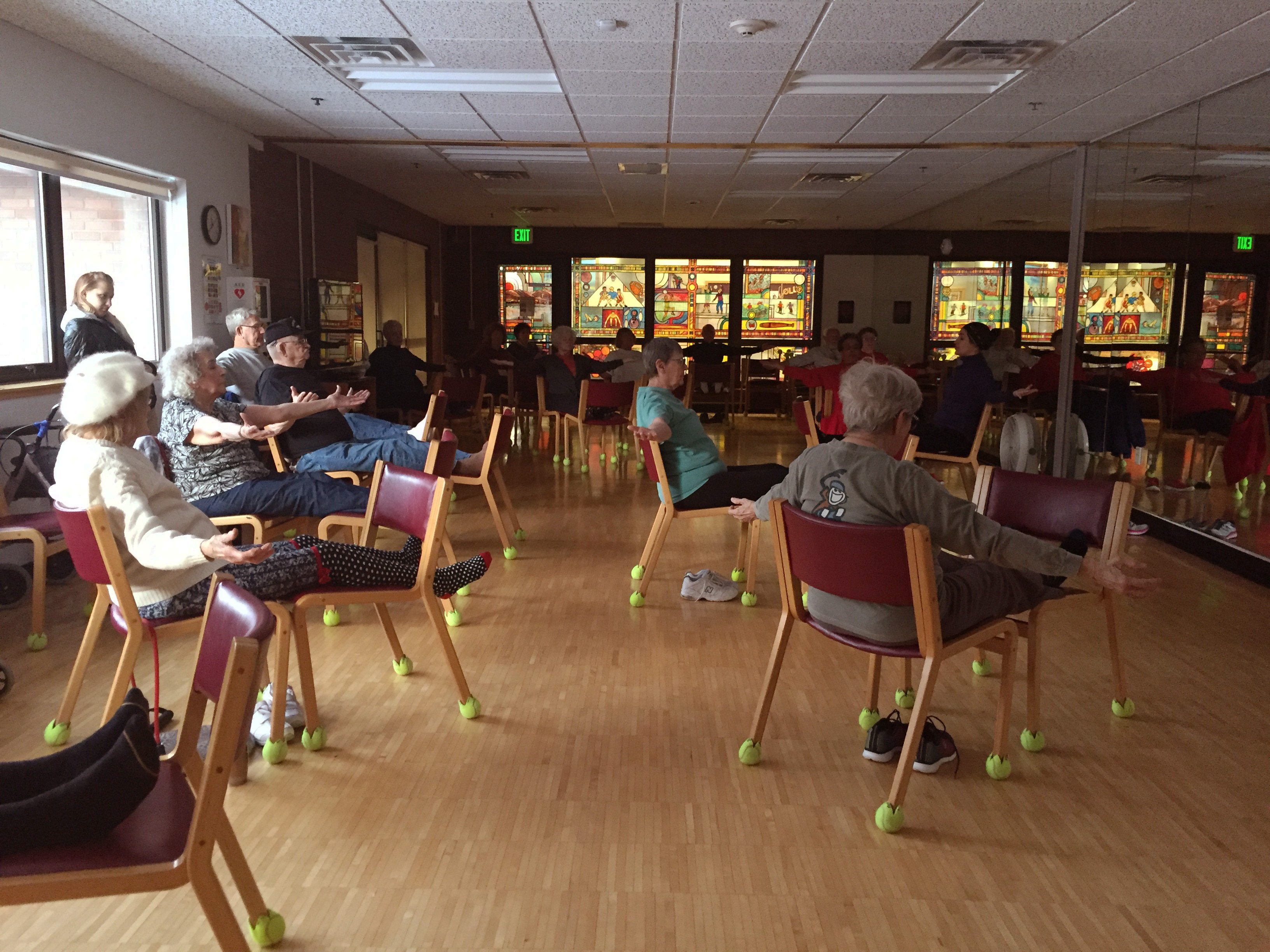 The chair yoga class at the Anchorage Senior Activity Center. (Photo by Anne Hillman/Alaska Public Media)