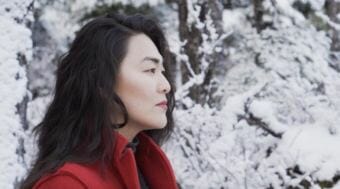 Christy NaMee Eriksen performs her poem "How To Say Goodbye." It the third film in her video series of poems filmed with videographer Ryan Cortes and musician Avery Stewart. The videos were created in support of a Rasmuson project grant. (Courtesy of the Artist)