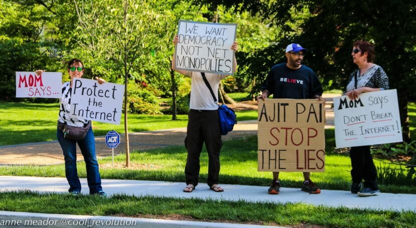 Protesters demonstrate in favor of net neutrality near the home of Federal Communications Commission Chairman Ajit Pai in May 2017. Some Alaska officials are looking at what they can do to restore the Obama-era policy.