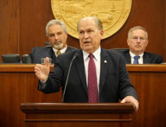 Independent Gov. Bill Walker addresses the Alaska Legislature on Jan. 18, 2018, in the Alaska State Capitol in Juneau. Senate President Pete Kelly, R-Fairbanks, and House Speaker Bryce Edgmon, D-Dillingham, are seated at the dais behind him. It was Walker's fourth State of the State Address. (Photo by Skip Gray/360 North)