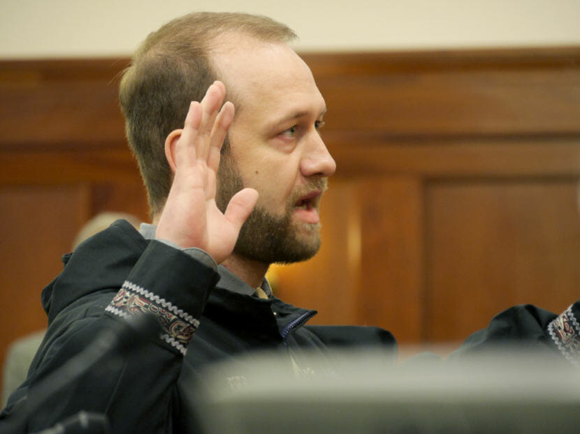 Rep. John Lincoln, D-Kotzebue, takes an oath during his swearing-in ceremony in the Alaska House of Representatives on Jan. 31, 2018.
