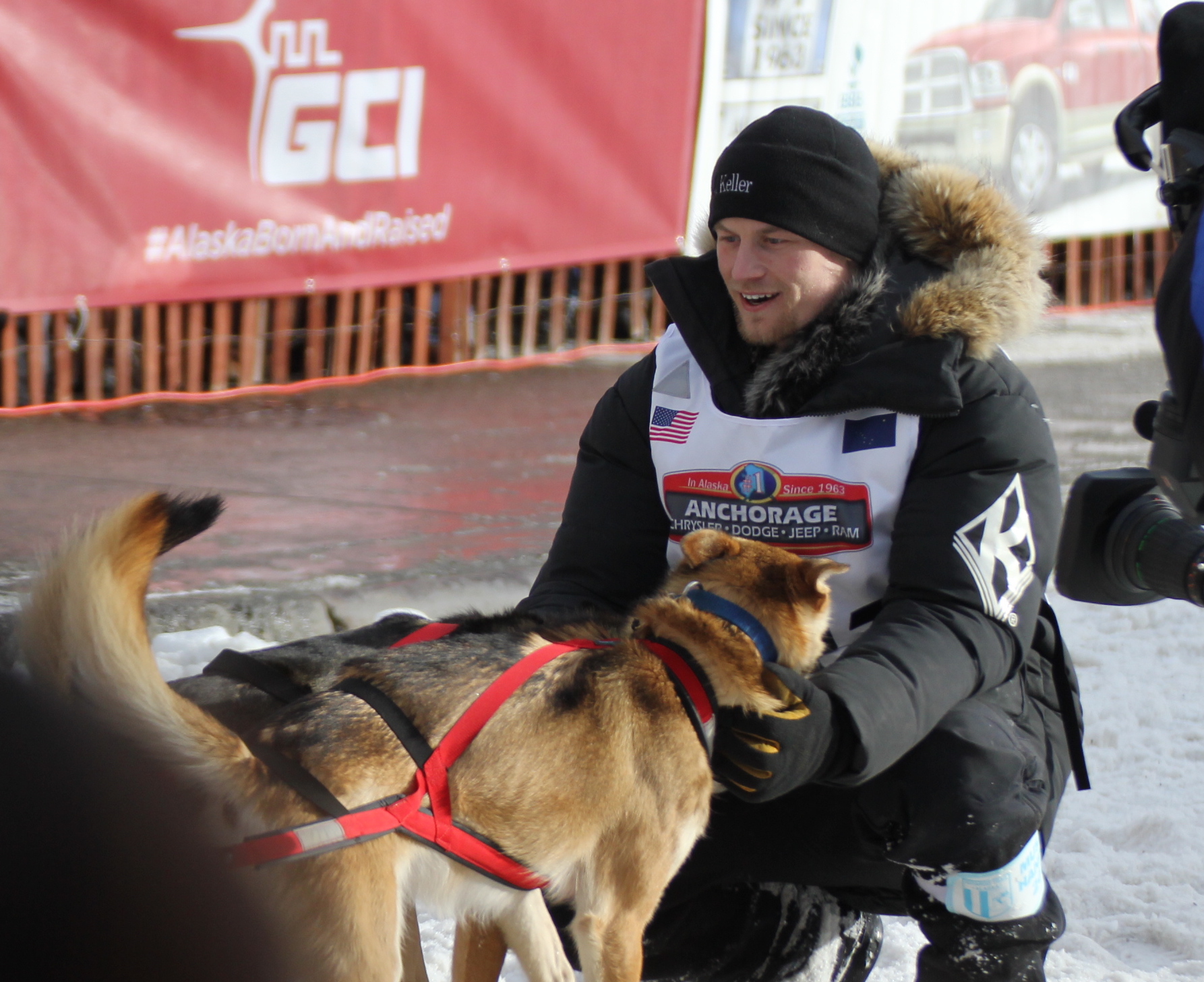 Defending Iditarod champion Dallas Seavey greets his leaders prior to the ceremonial start of Iditarod 2016. (Photo by Ben Matheson/Alaska Public Media.)