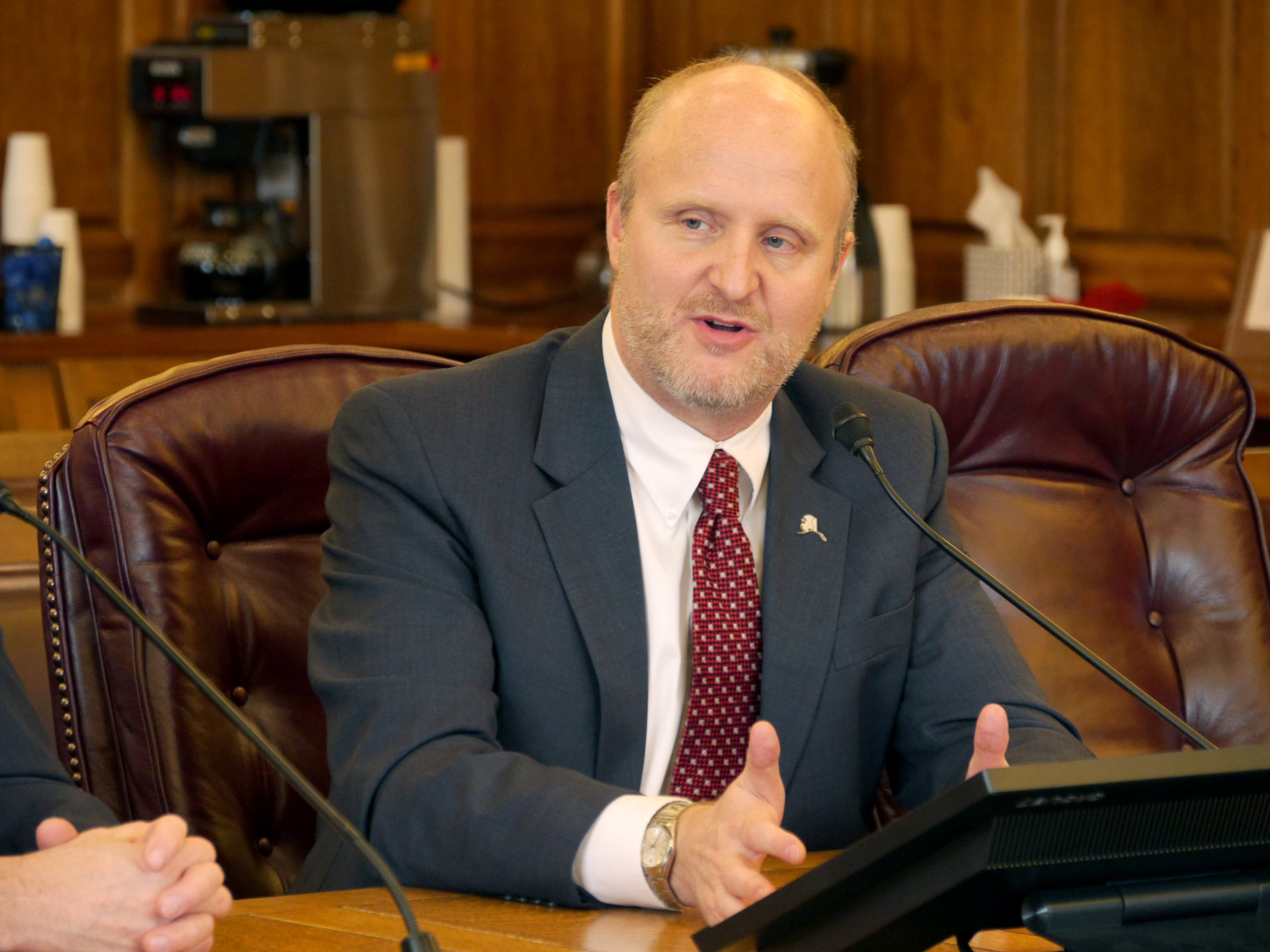 The Alaska Department of Revenue's Tax Director Ken Alper fields questions from members of the House Finance Committee in the Alaska State Capitol on Feb. 27, 2018. (Photo by Skip Gray/360 North)