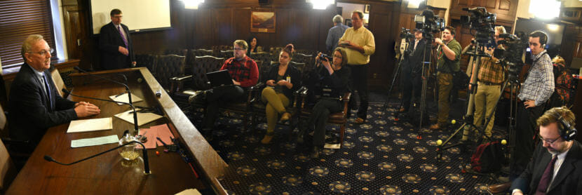In this three-photo composite, Alaska House Speaker Bryce Edgmon, D-Dillingham, talks to members of the press in the Speaker’s Chambers in the Alaska State Capitol on March 28, 2018. Reporters asked about progress on the state operating budget. (Photo by Skip Gray/360 North)