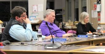 Juneau School Board members Dan DeBartolo, Emil Mackey and Andi Story prepare to vote on the district's Fiscal Year 2019 budget at a special meeting on March 27, 2018.
