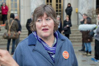 Sara Hannan attends a student walkout protest outside the Alaska Capitol building in Juneau on Wednesday, March 14, 2018. Hannan is a candidate for statehouse.