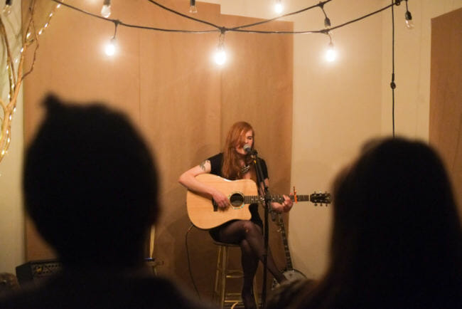 Back in Juneau after moving to Wisconsin, guitarist Dara Rilatos performs at the Rendezvous Wednesday night and hosts Bad Babes and Bandanas at Rockwell Friday night. (Photo by Annie Bartholomew/KTOO)