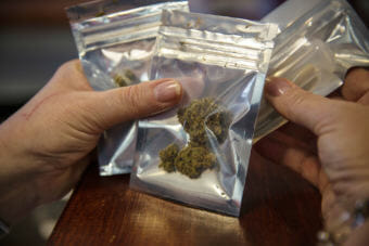 Medical marijuana is dispensed in Takoma Park, D.C. in 2014. (Photo by Evelyn Hockstein/The Washington Post/Getty Images)
