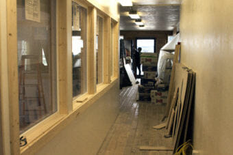 Icy Strait Brewing co-owner Tawney Letterman works on the brewery's remodel of a former downtown Hoonah eatery. (Photo by Tripp J Crouse/KTOO)