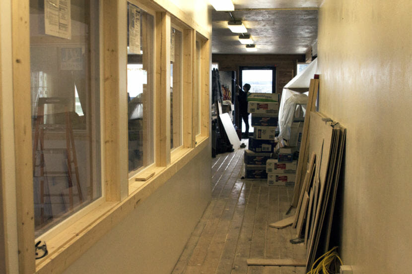 Icy Strait Brewing co-owner Tawney Letterman works on the brewery's remodel of a former downtown Hoonah eatery. (Photo by Tripp J Crouse/KTOO)