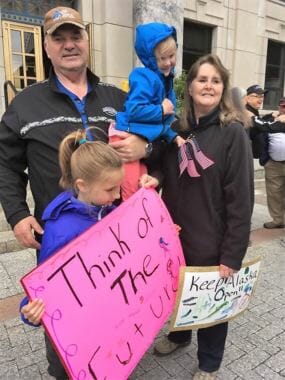Don Etheridge, his wife and grandchildren take part in a demonstration supporting public employees and construction at the Capitol June 11, 2017. Nonpartisan Etheridge is running for Juneau's Senate seat. (Photo courtesy Don Etheridge)