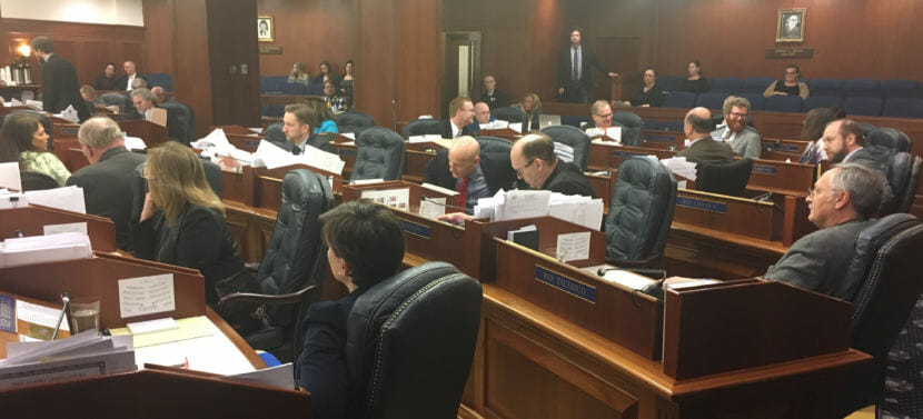 Alaska House of Representatives members wait during a break a few minutes before ending the legislative session at 1:30 a.m. on Sunday, May 13, 2018. The Legislature passed its operating and capital budgets on Saturday. (Photo by Andrew Kitchenman/KTOO)