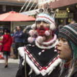 Various indigenous groups march and dance during a parade Saturday, June 9, 2018, in downtown Juneau, Alaska. (Photo by Tripp J Crouse/KTOO)