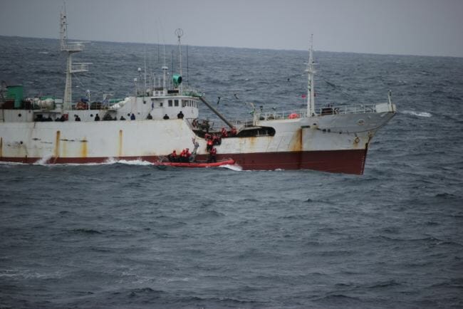 A USCGC Alex Haley boarding team boards the fishing vessel Run Da after the vessel was suspected of illegal high seas driftnet fishing in the North Pacific Ocean, 860 miles east of Hokkaido, Japan, June 16, 2018. (Photo courtesy of U.S. Coast Guard)
