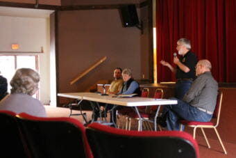 Forest Ranger Jason Anderson, left, University of Alaska Land Management Director Christine Klein, USFS Forester Chris Maisch and Mental Health Land Trust Executive Director Wyn Menefee respond to questions at the timber sale open house. (Photo by Henry Leasia/KHNS)