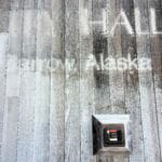 On the outside of the City Hall building, you can still see the shadow of the name 'Barrow.' June 5th, 2018. (Photo by Ravenna Koenig/ Alaska's Energy Desk).