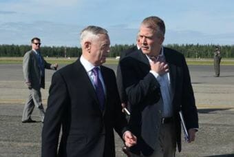 Secretary of Defense James N. Mattis speaks with Alaska Senator Dan Sullivan on June 25, 2018 on the Eielson Air Force Base, Alaska, flight line. Mattis and Sullivan held a joint press conference after a visit to Fort Greely, Alaska. (Photo by Airman 1st Class Eric M. Fisher/U.S. Air Force)