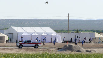 The Pentagon plans to build temporary camps for detained immigrants. Here, children of detained migrants are seen at a tent encampment near the U.S. Customs and Border Protection port of entry in Tornillo, Texas