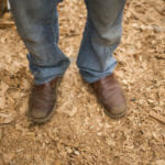 Wooden shavings cover the floor of work site at the Harborview Elementary School covered area on May 29, 2018. (Photo by Annie Bartholomew/KTOO)