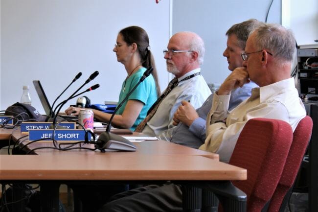Juneau School District Superintendent Mark Miller looks on as board members deliberate over his contract on Friday, July 27, 2018. (Photo by Adelyn Baxter/KTOO)