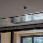 Water from a 3rd floor fire rains through the ceiling of the 1st floor lobby of the Mendenhall Towers on Thursday July 5th, 2018 (Photo by Mikko Wilson/KTOO)