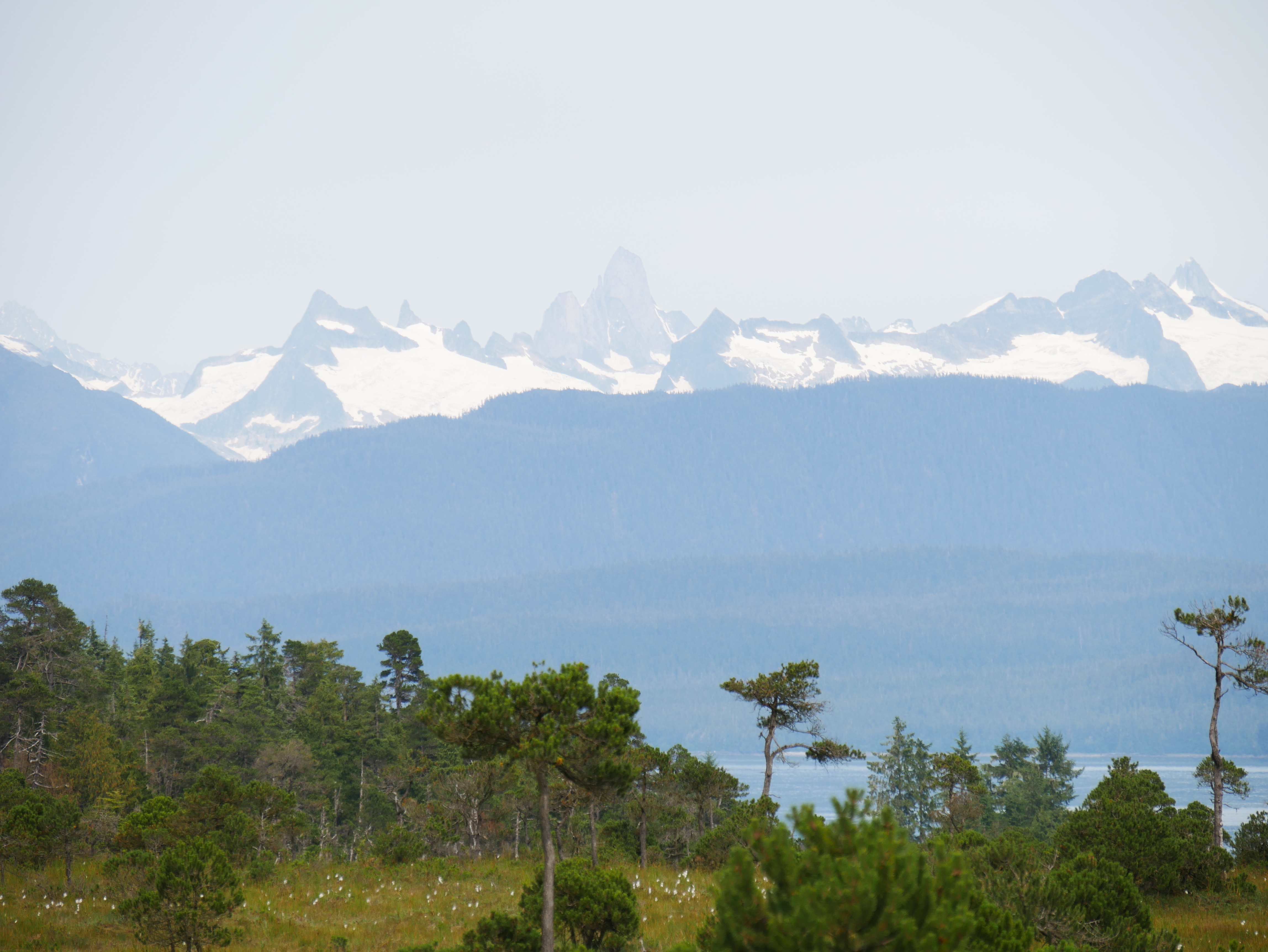 Smoky haze obscures the 9,077-foot Devil’s Thumb, about 25 miles northeast of Petersburg, this week. (Photo by Joe Viechnicki/KFSK)