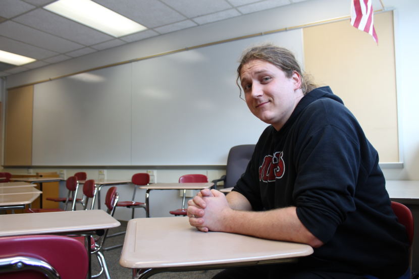 English teacher Scott Grant sits in his classroom in Juneau-Douglas High School on Friday, Aug. 17, 2018. (Photo by Adelyn Baxter/KTOO)